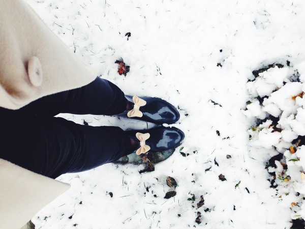 photo of my feet in black weather boots in the snow