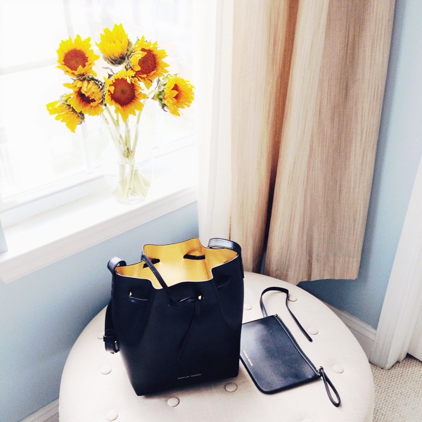 Black bucket bag purse with gold lining