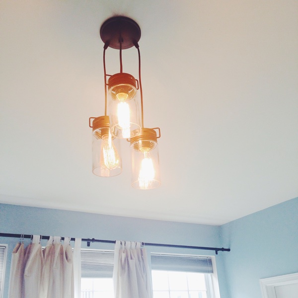 new light fixture has mason jar like pendants with edison bulbs